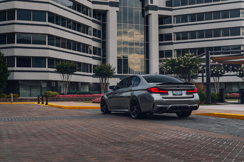 Bmw m5 f90 in gray rear view