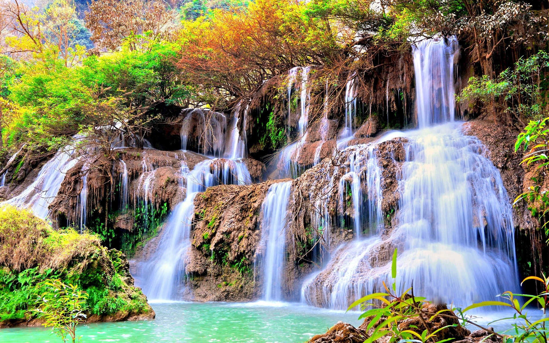 Large waterfall with green water
