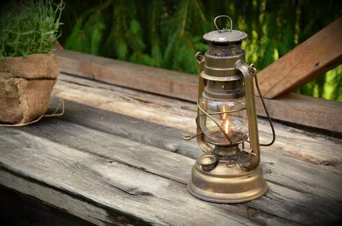 An antique hand-held lantern