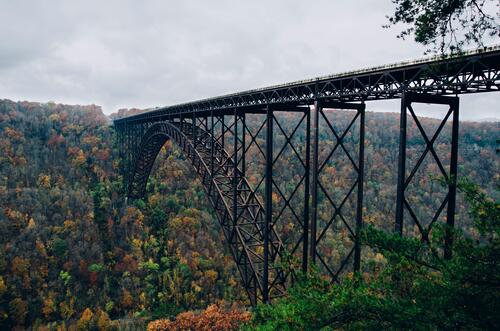 Big iron viaduct on a cloudy fall day.