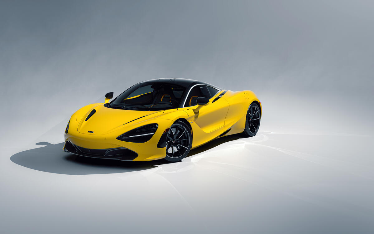 Mclaren 720S in yellow on a plain background