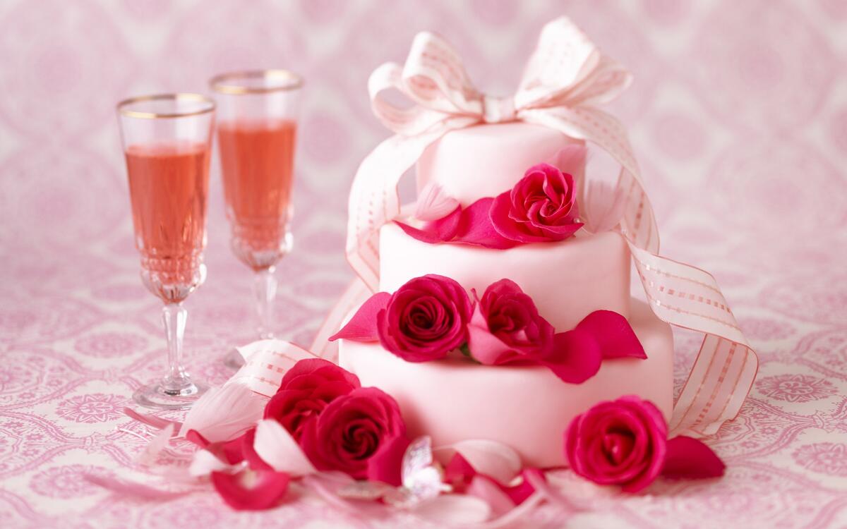 A cake with roses and champagne
