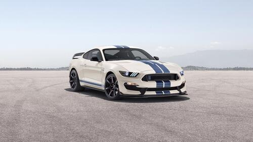 White ford mustang shelby gt350 with blue stripes on the hood