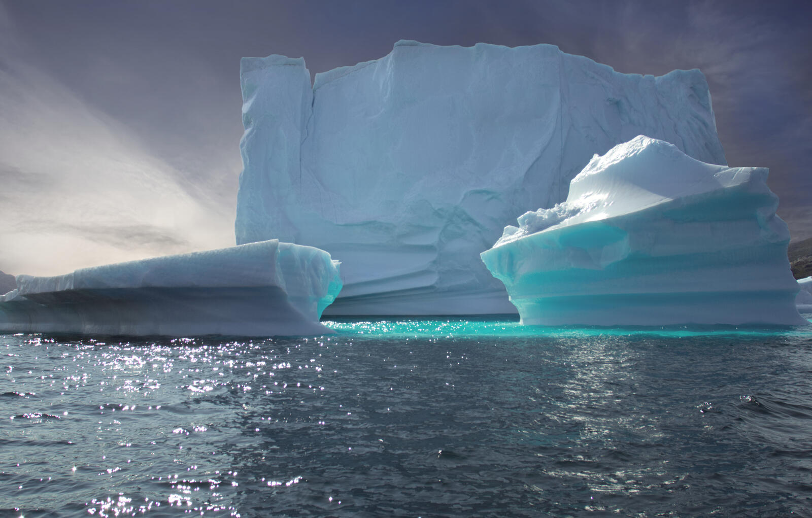 Free photo Three large ice floes on the water