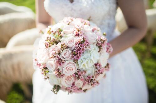 A bride with a gorgeous bouquet of flowers