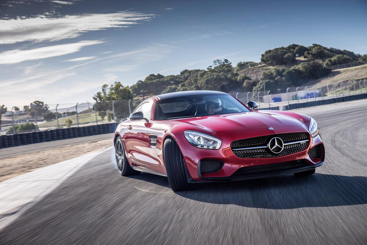 A sporty Mercedes-Benz AMG GT in a skid.