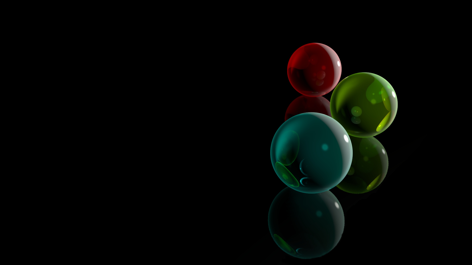 Free photo Three multicolored spheres on a black glass surface