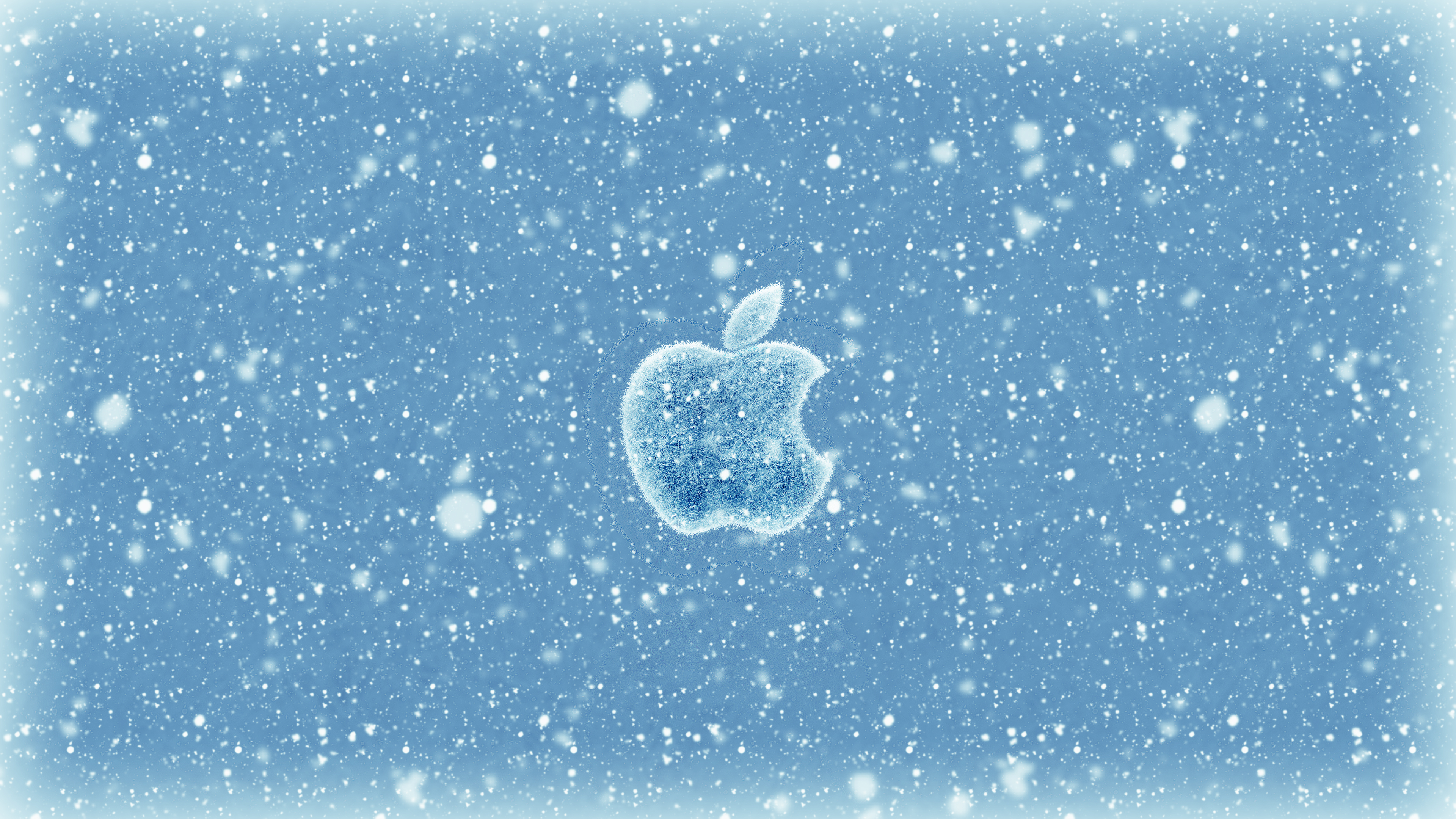 Бесплатное фото Логотип эпл на снежном фоне