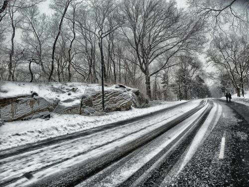 Winter road in warm weather