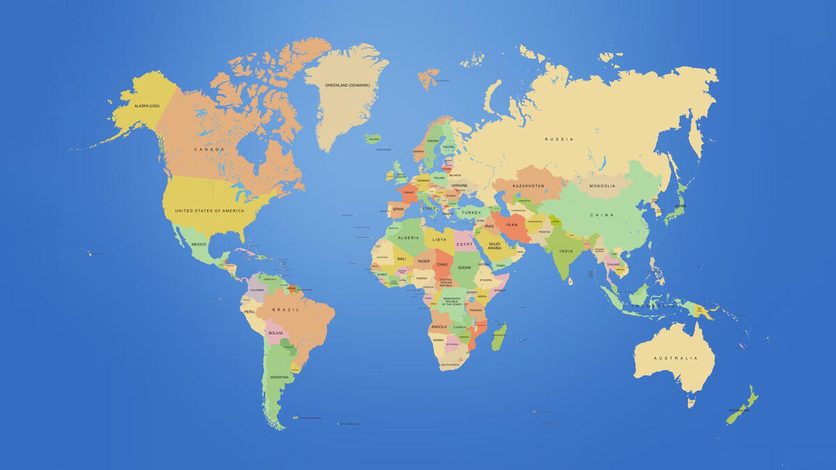 Multicolored world map on blue background