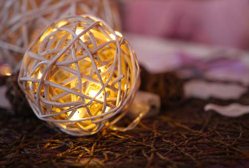A garland wrapped in a ball of string.