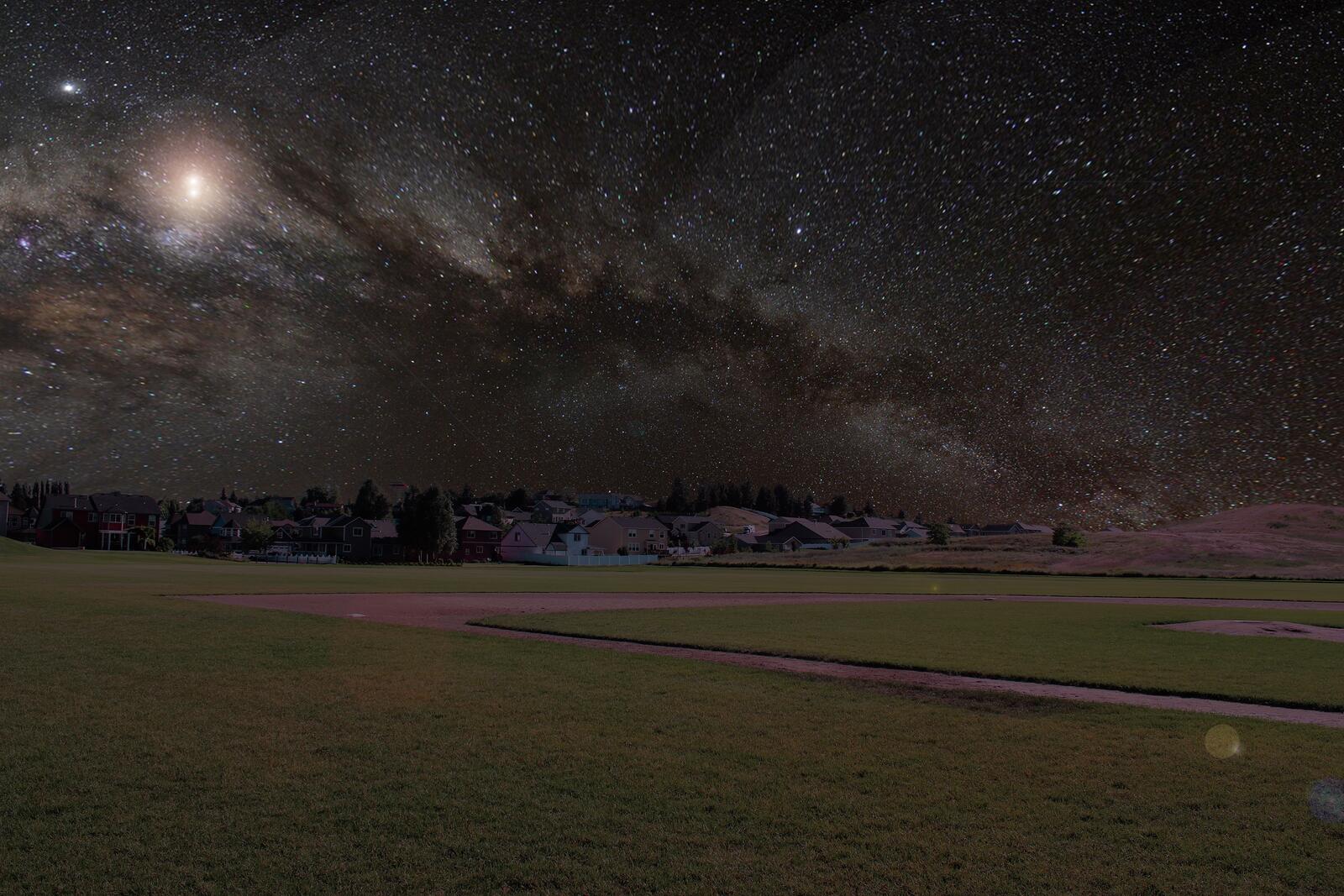 Бесплатное фото Звездное небо над деревней