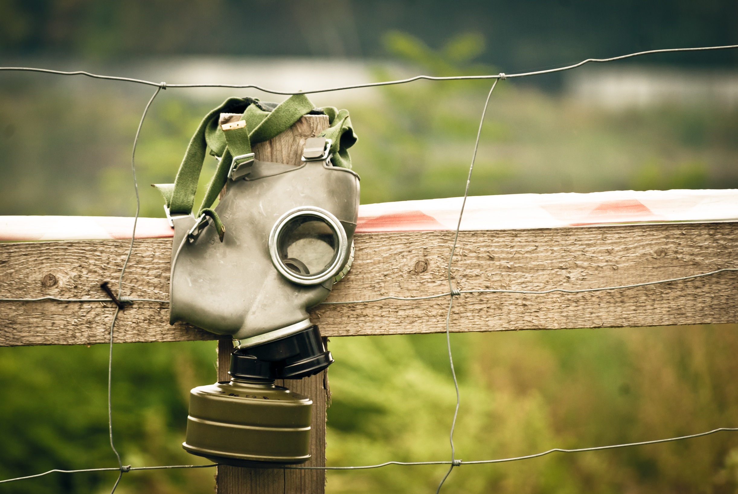 A gas mask left on the fence