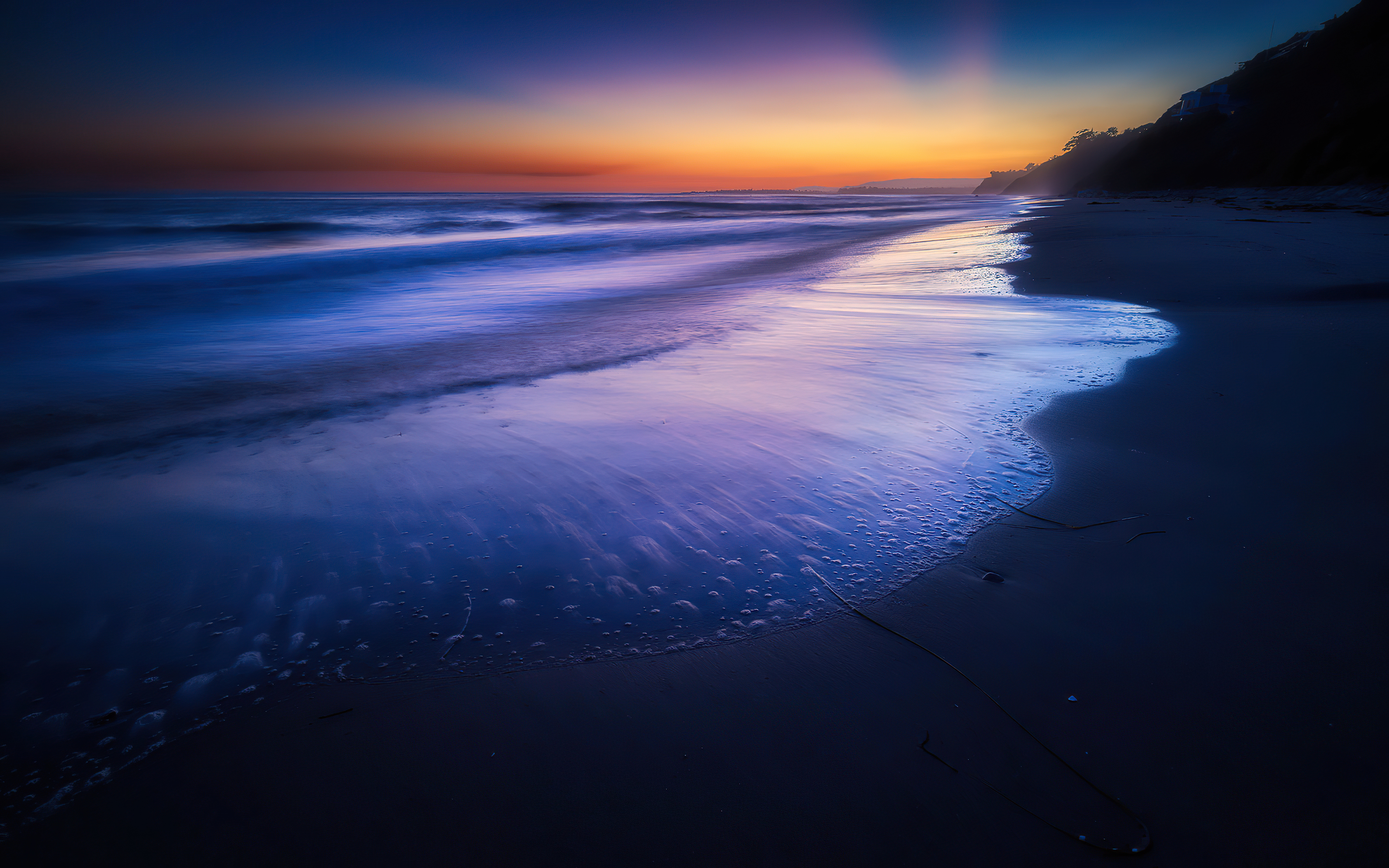 免费照片沙滩上的晚间夕阳