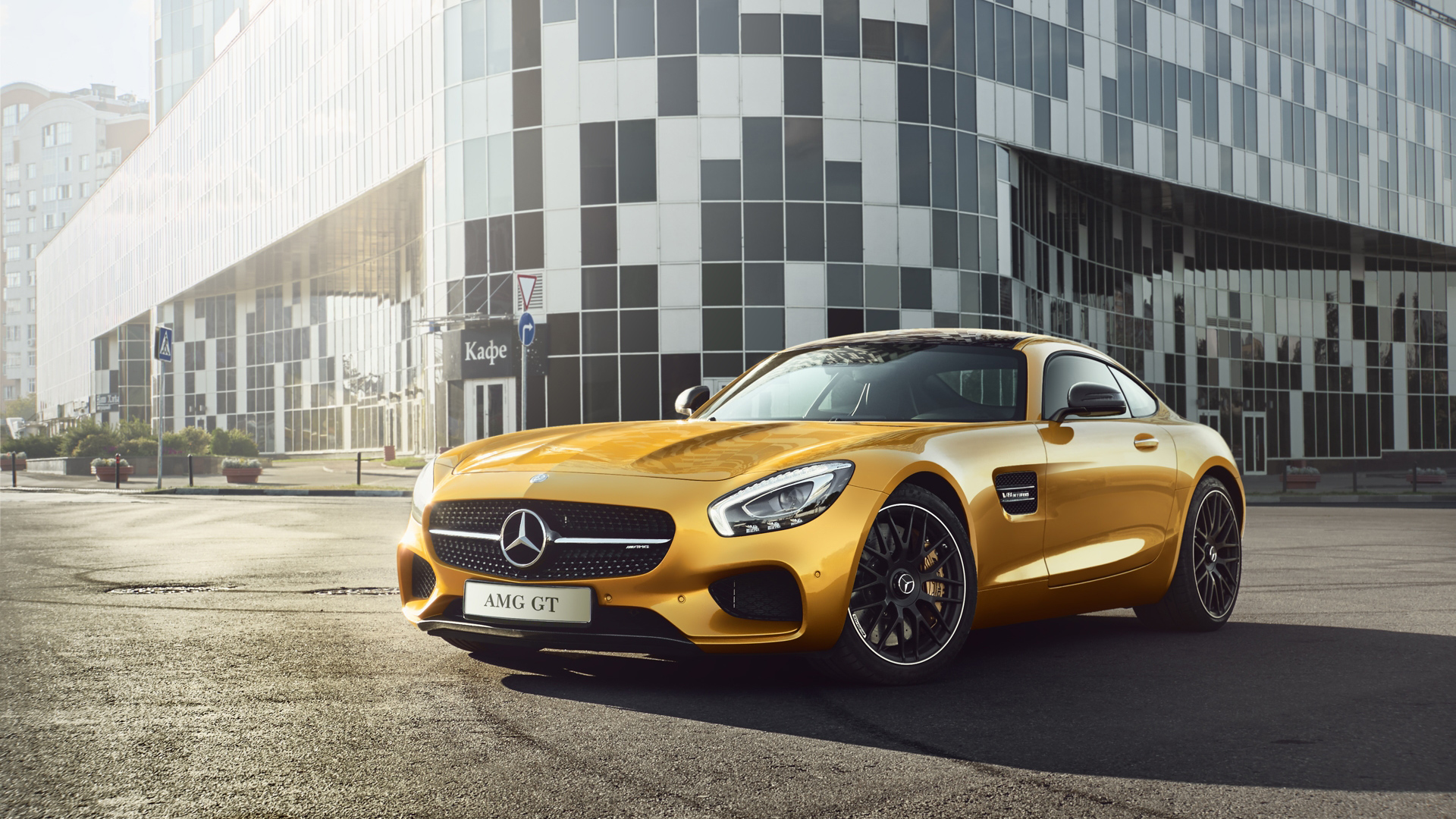 Mercedes AMG GTR yellow in sunny weather
