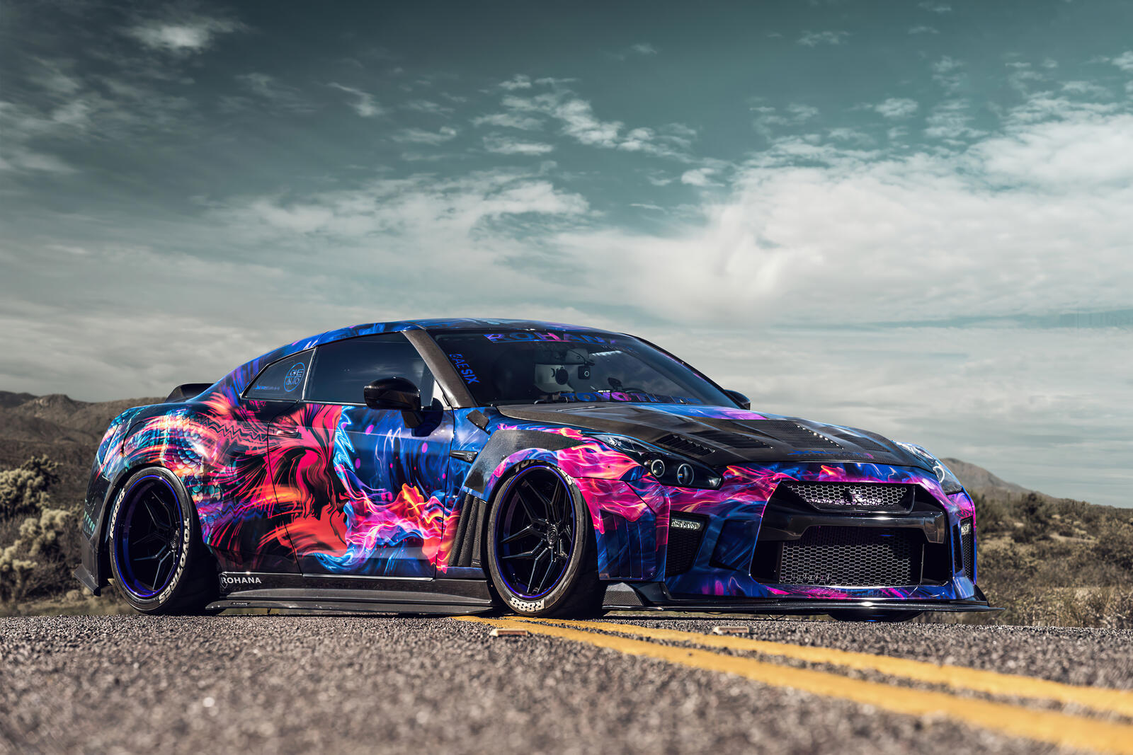 Free photo Wallpaper with Nissan GTR in cool coloring on the desktop