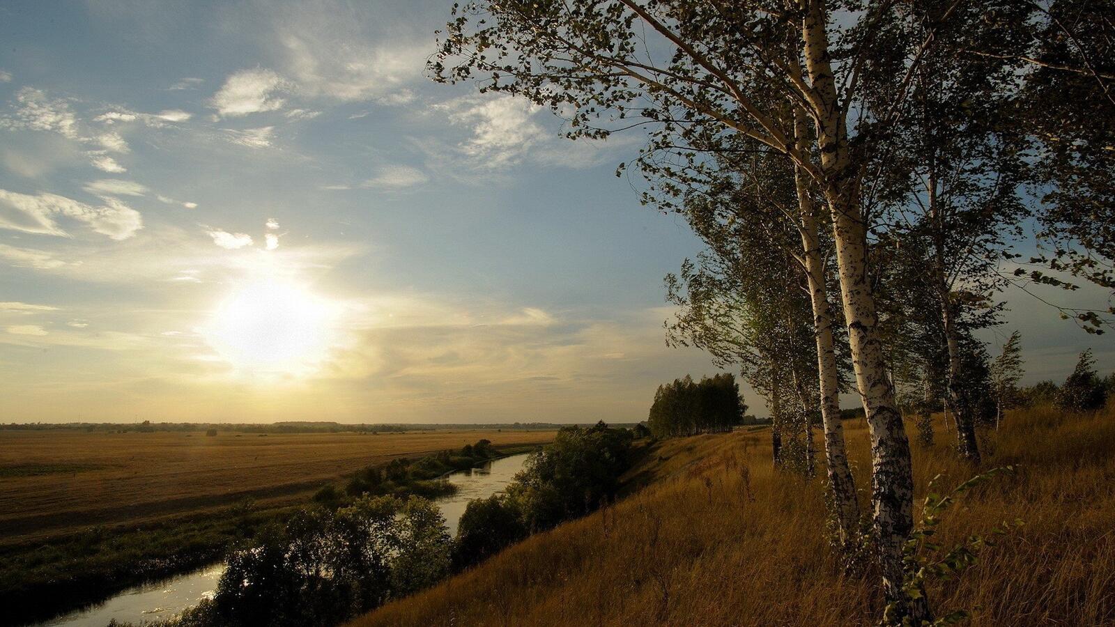 Бесплатное фото Красивый деревенский пейзаж с рекой