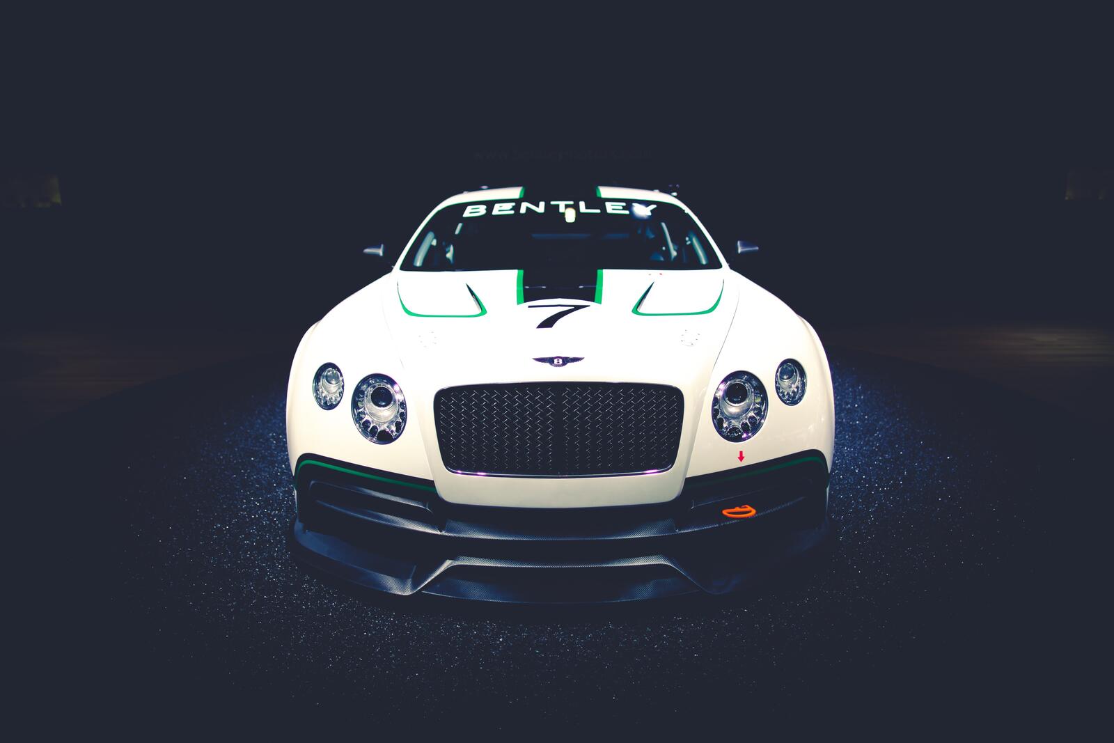 Free photo Bentley Continental GT3 in white on a black background