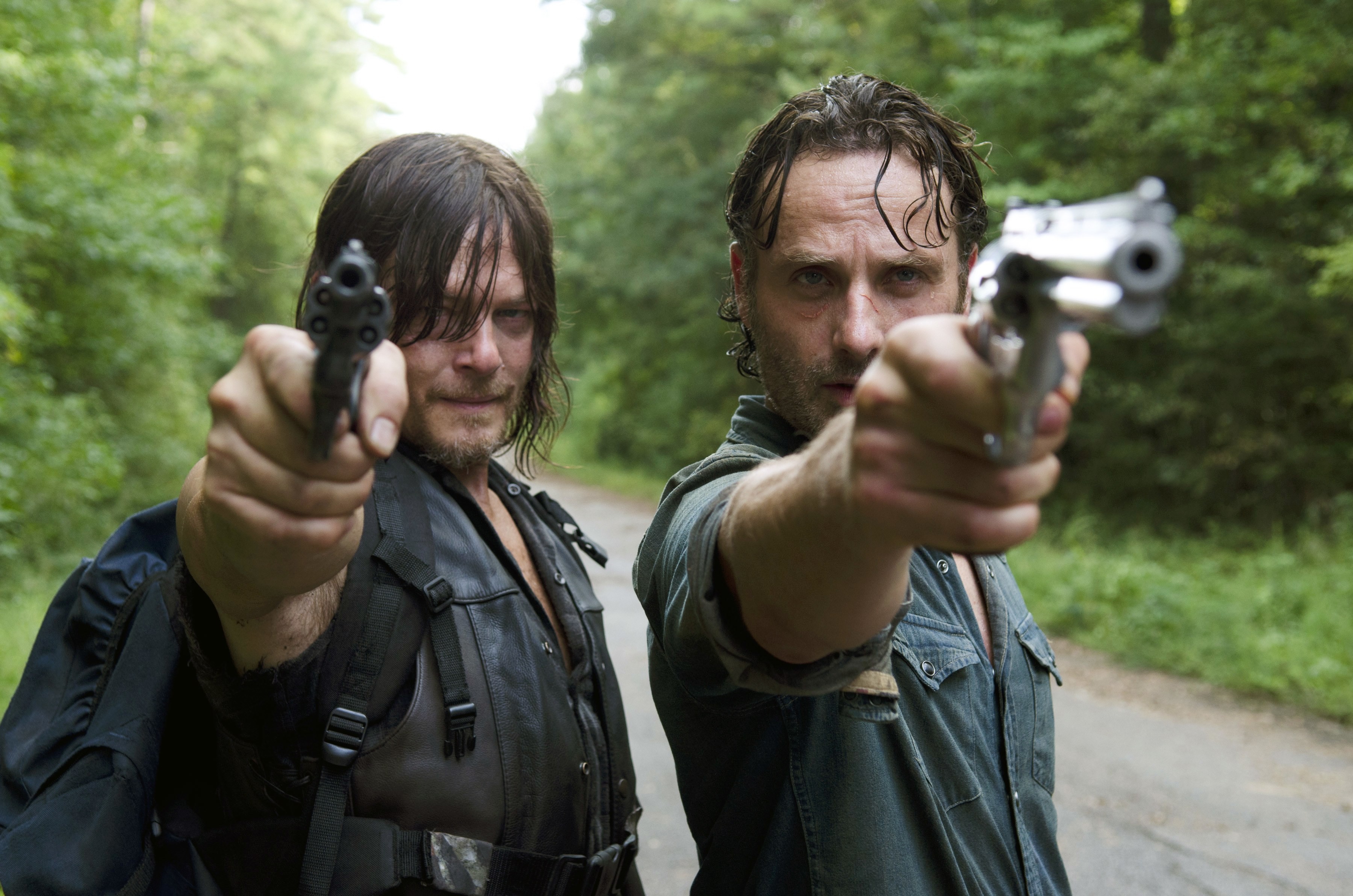 Rick and Daryl with guns