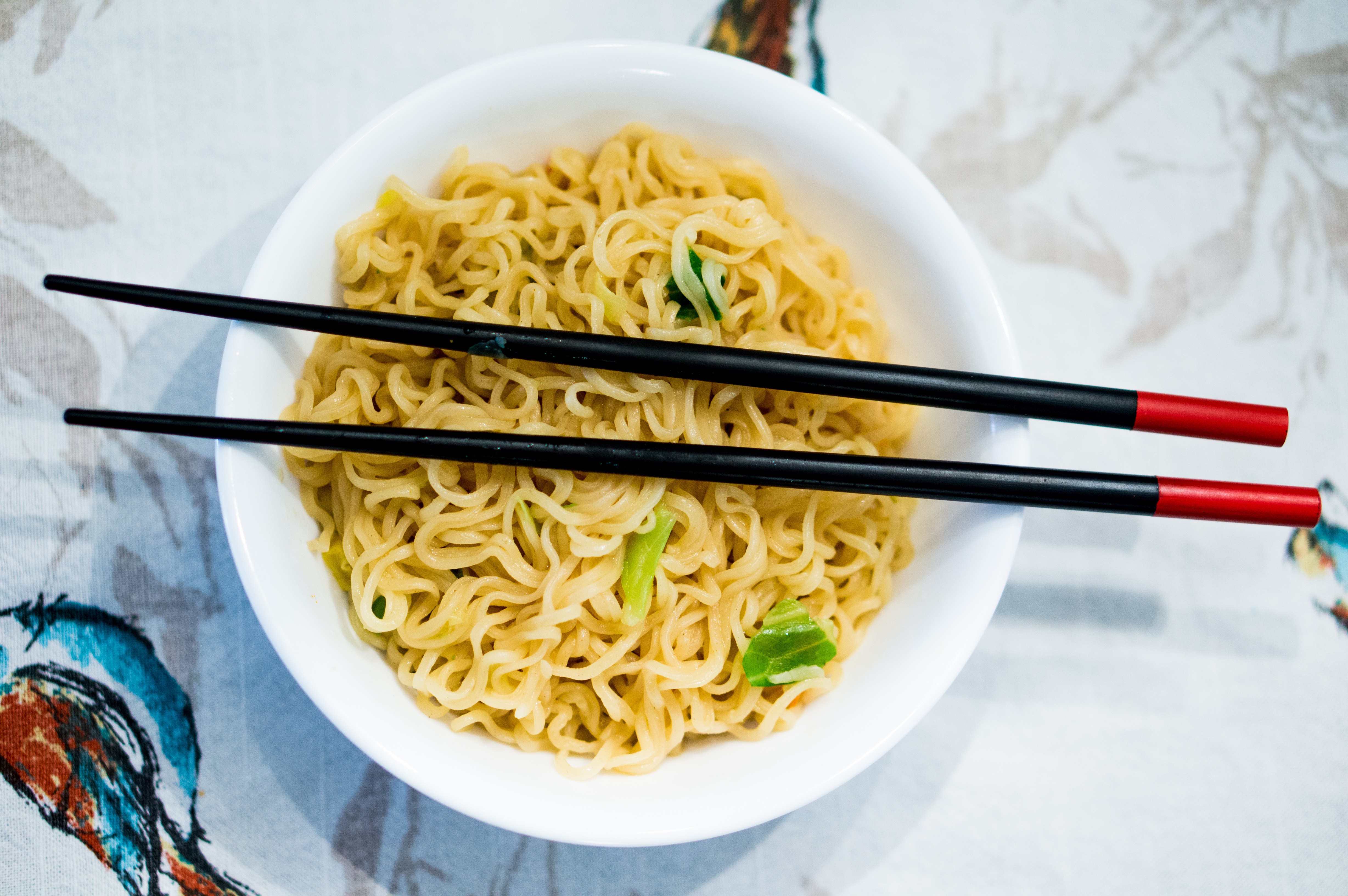 Chinese noodles with Chinese chopsticks.