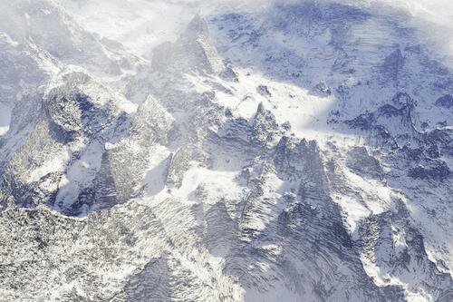 Snowy mountains top view
