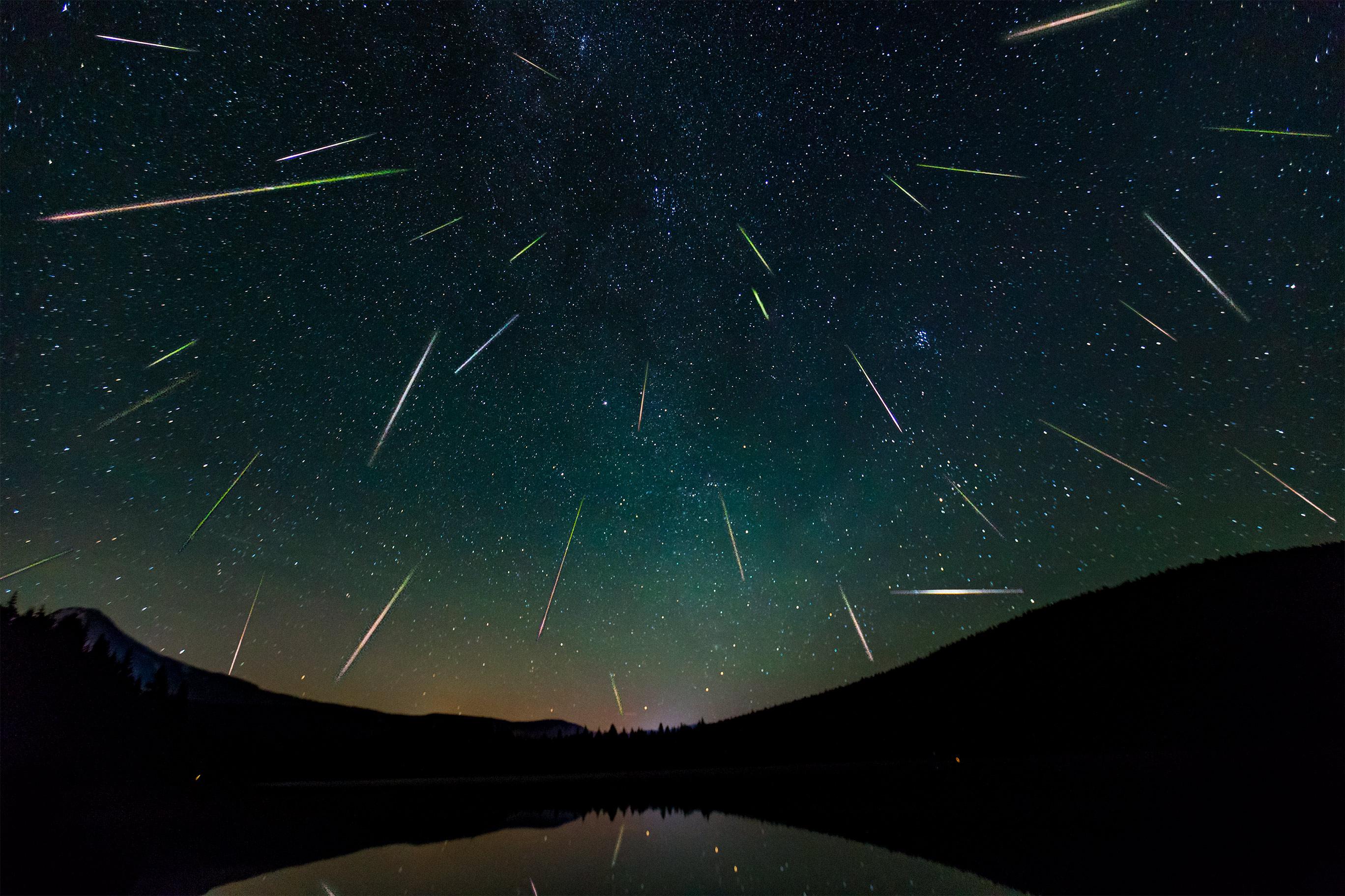 A meteor shower in the night sky.
