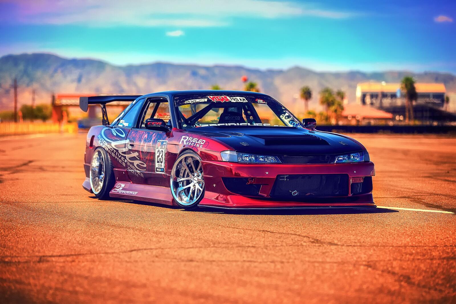 Free photo Tuned nissan silvia s14 in red color