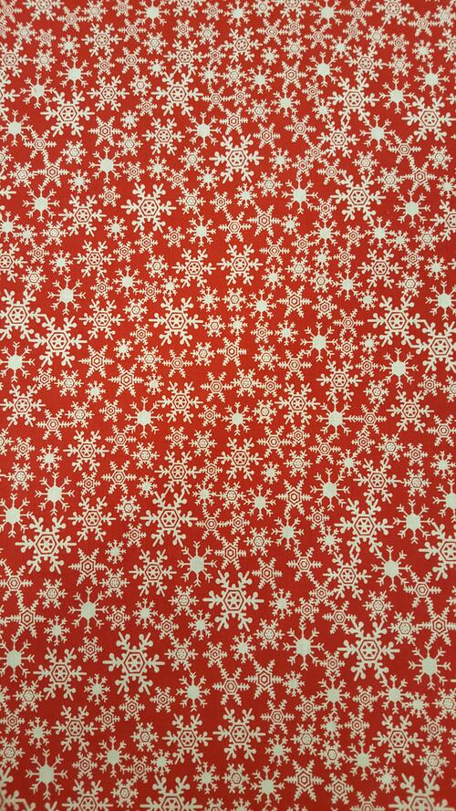 New Year snowflakes on a red background