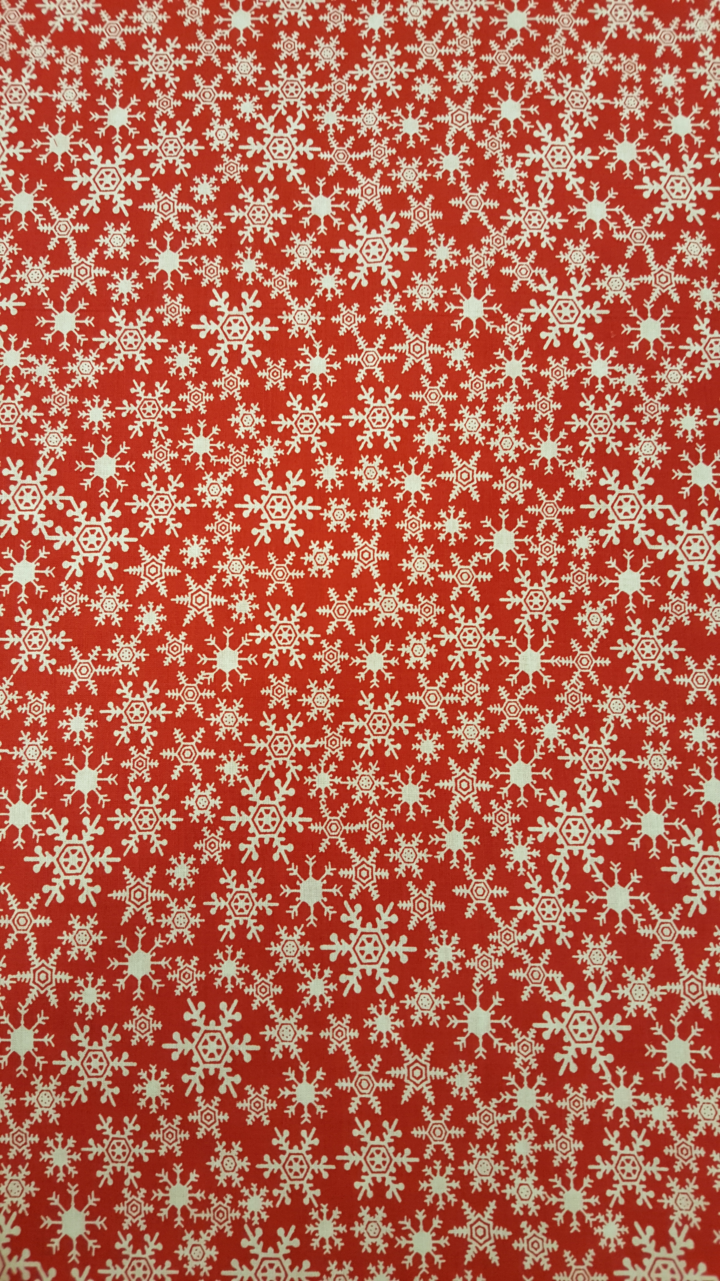 Free photo New Year snowflakes on a red background