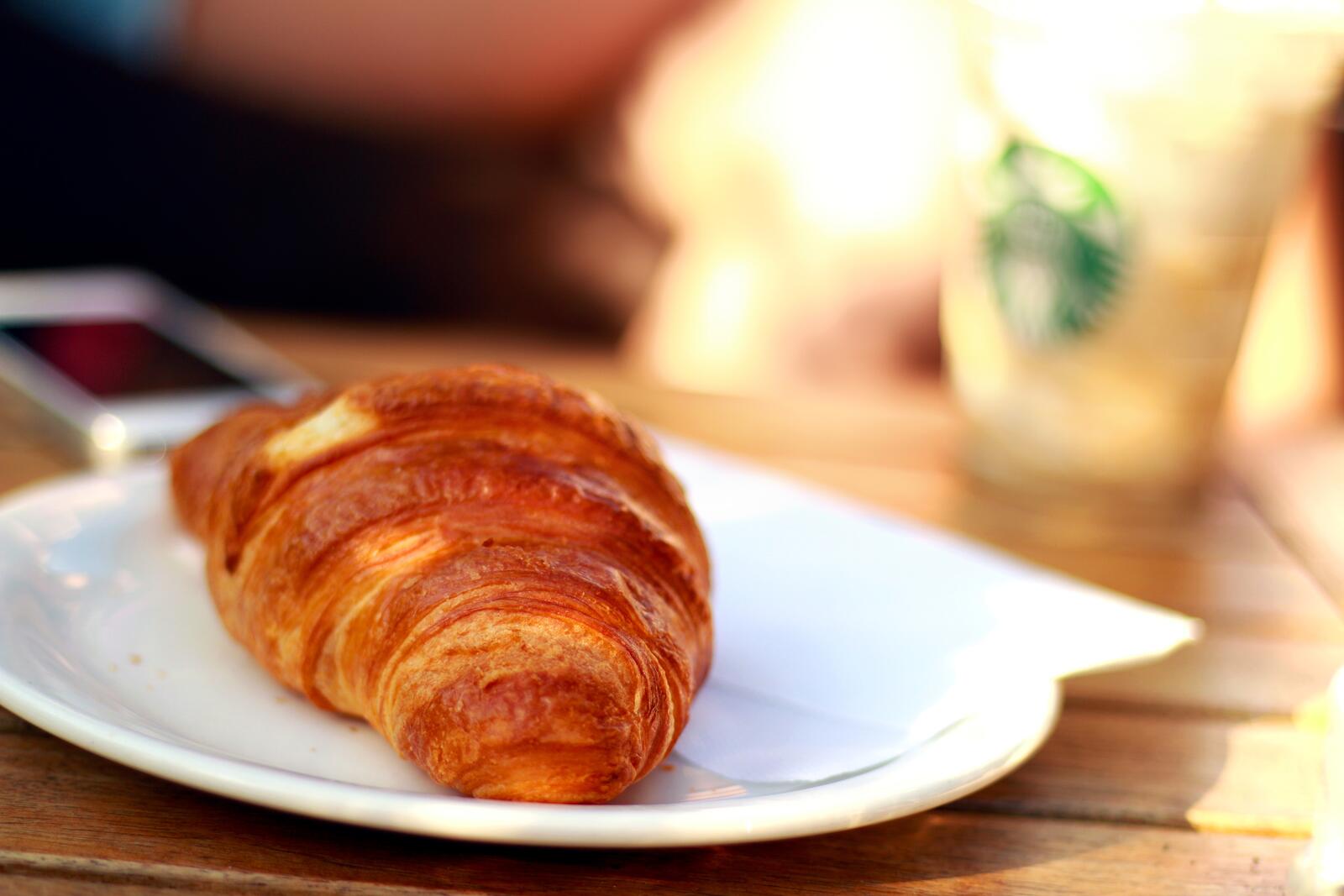 Free photo Croissant on a white plate.