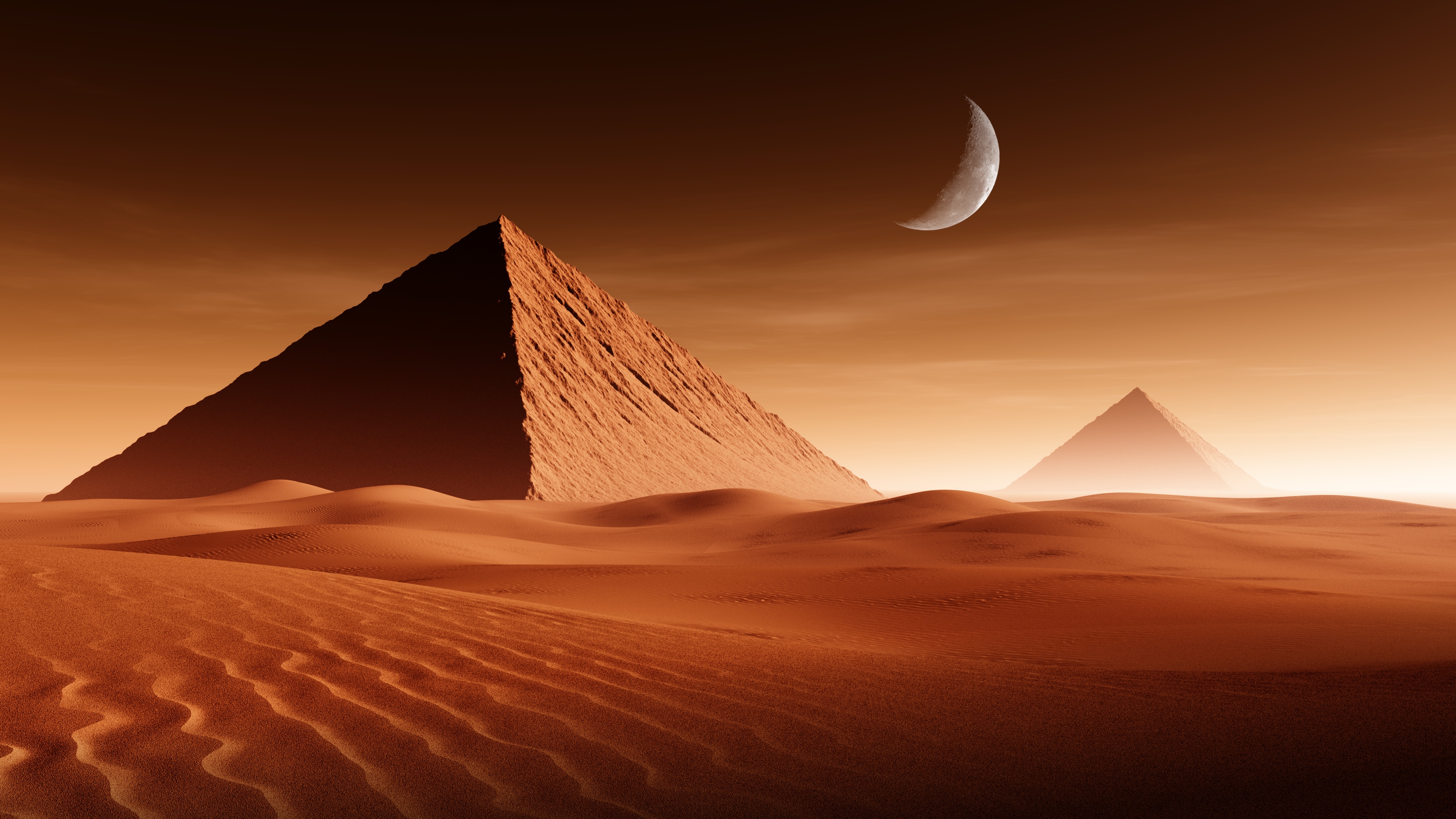 Pyramids in the desert at sunset