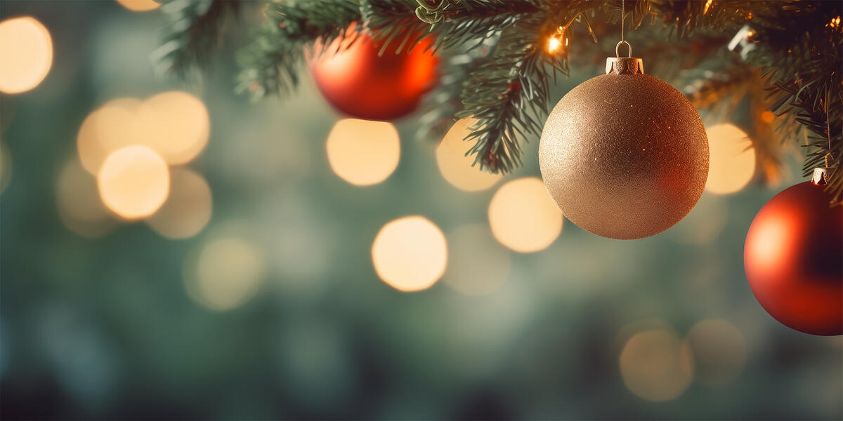 A golden Christmas toy on a Christmas tree
