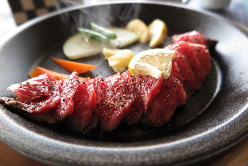 Raw meat in a skillet