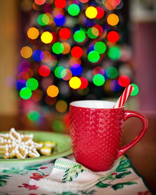 New Year`s mug in red color with yummy treats