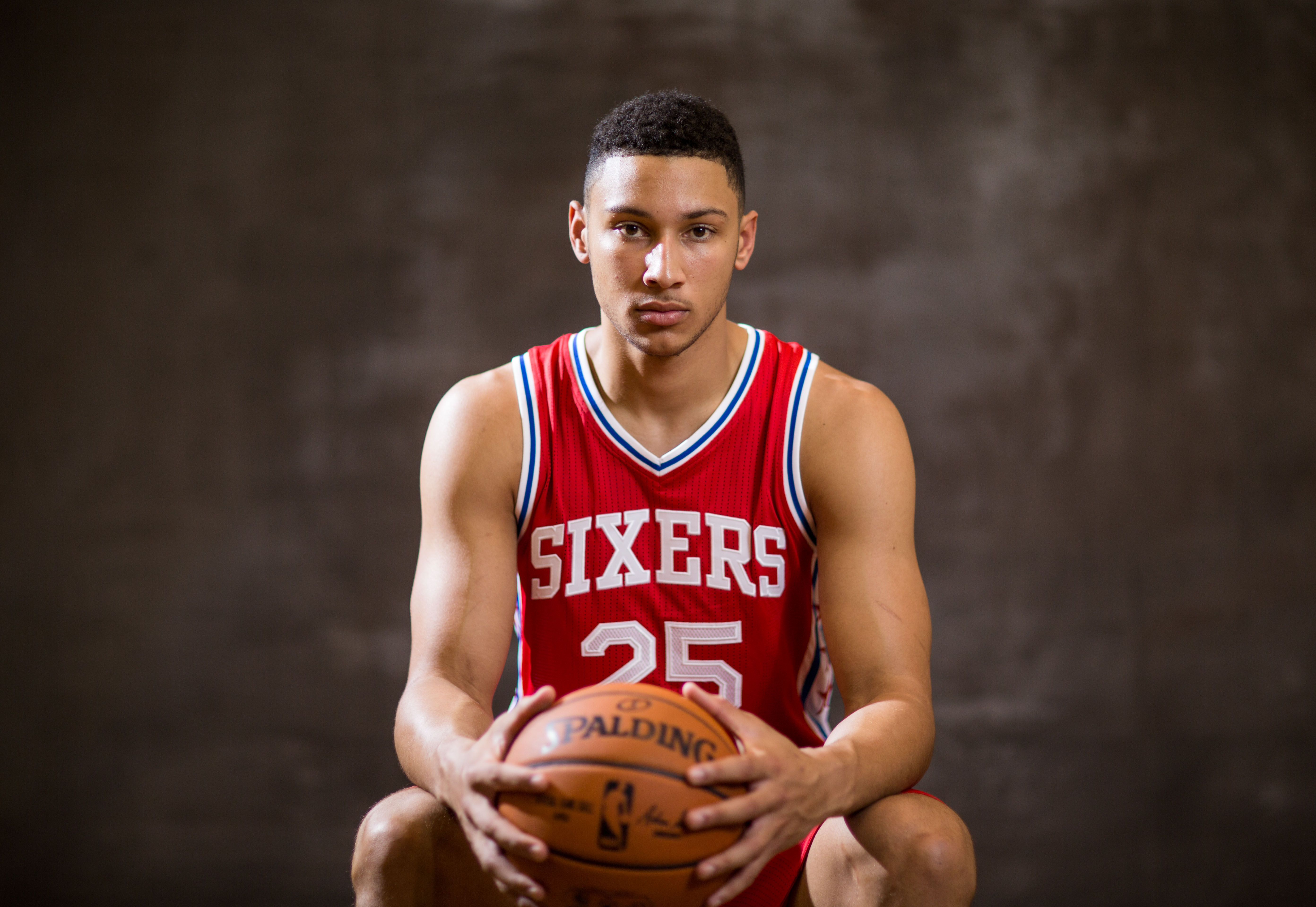 Free photo Ben simmons with a basketball.