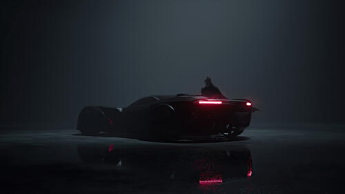 Бэтмобиль на темном туманном фоне