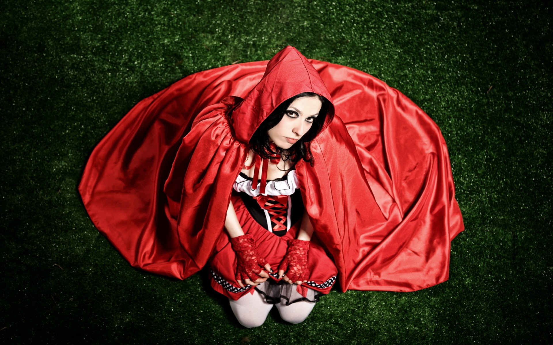A girl in a Little Red Riding Hood costume