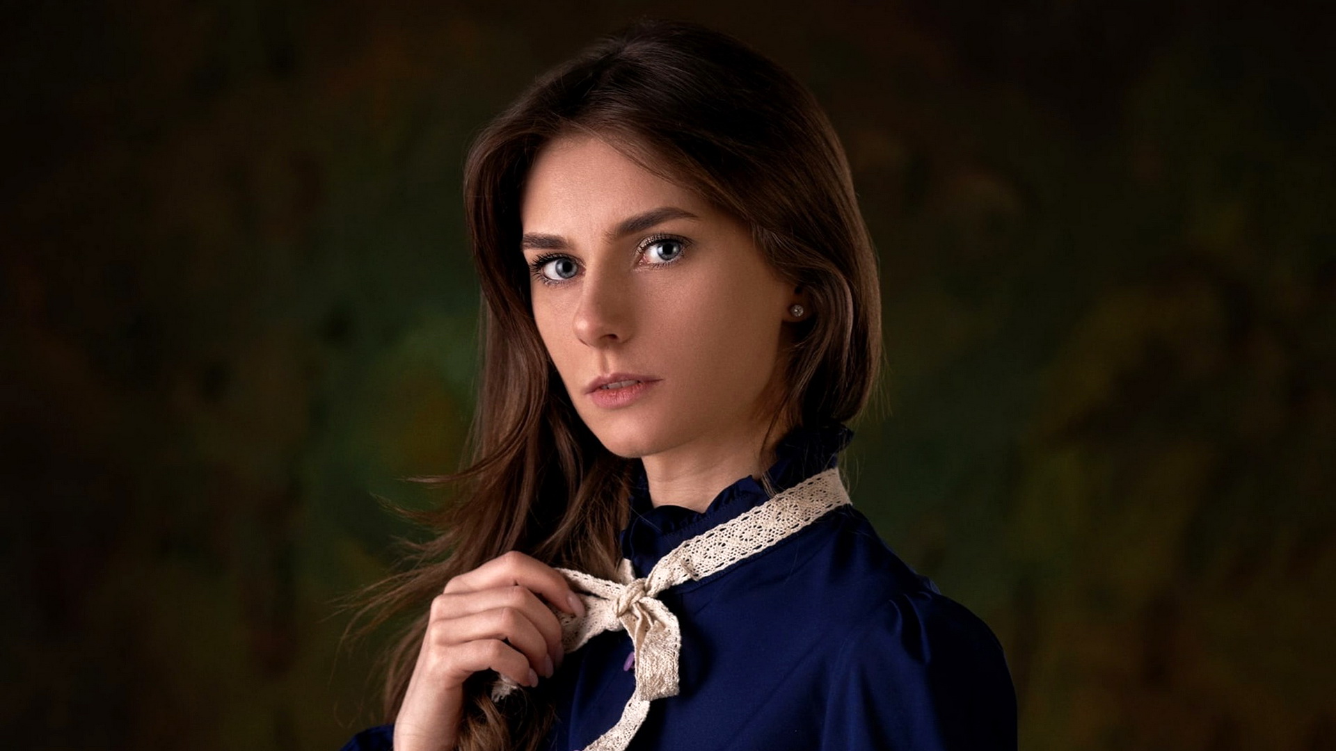 Free photo Portrait of Anastasia Orlovskaya in a Blue Dress