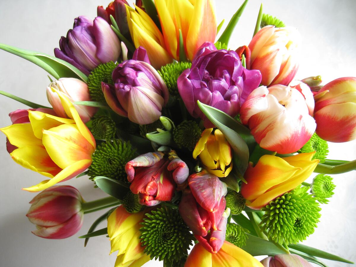 Chic bouquet of colorful Peruvian lilies with tulips