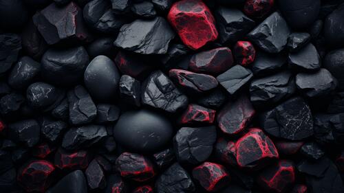Красноватые камни среди черных