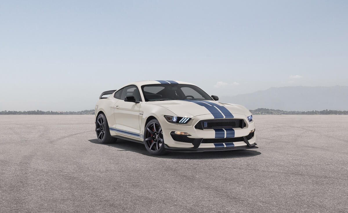 White 2019 Ford Mustang with blue stripes