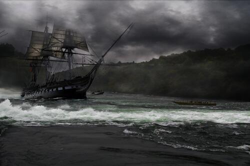 A pirate ship in bad weather drifts ashore