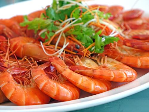 A plate of boiled shrimp.