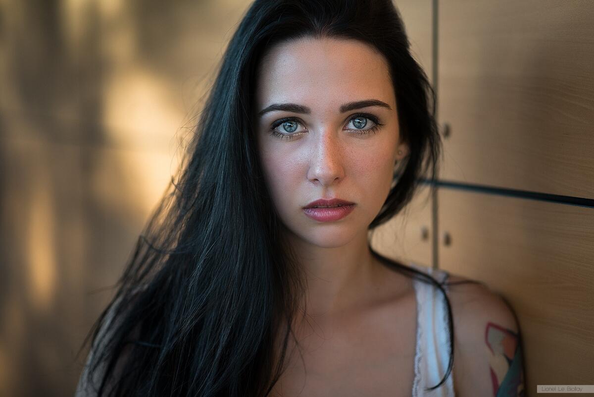 Portrait of a dark-haired girl with beautiful eyes
