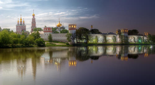 Reflection of the city in the moscow river