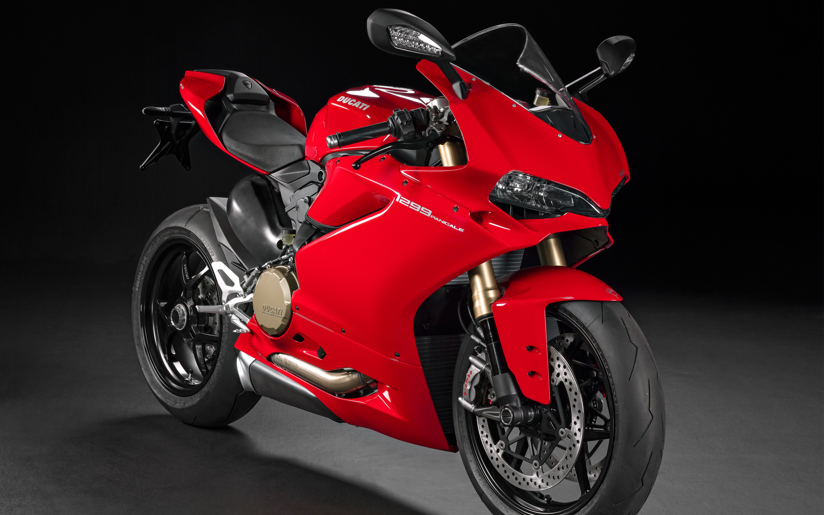 Free photo Ducati sports red motorcycle on a dark background