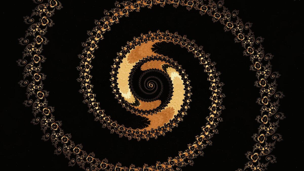 Золотистый фрактал спираль на черном фоне