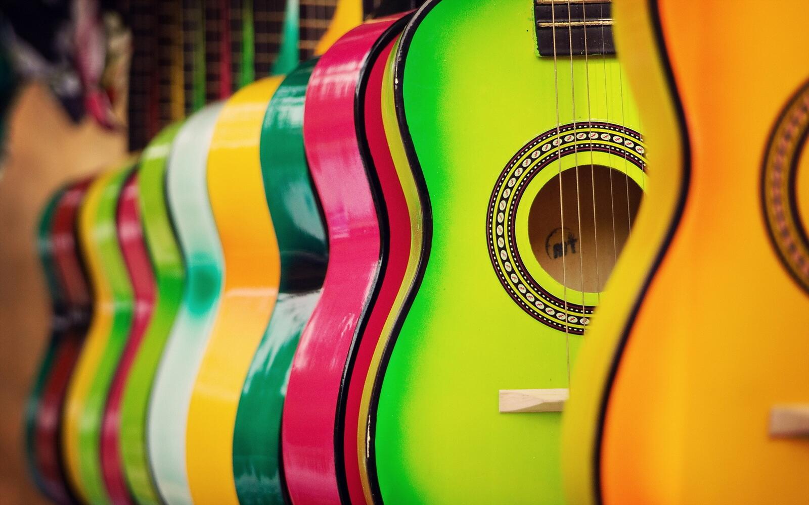 Free photo A picture of colored guitars