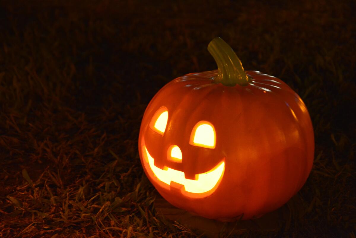 A lighted Halloween pumpkin.