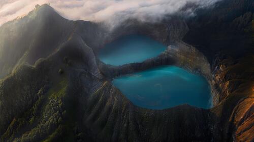 A picturesque crater in the mouth of a volcano
